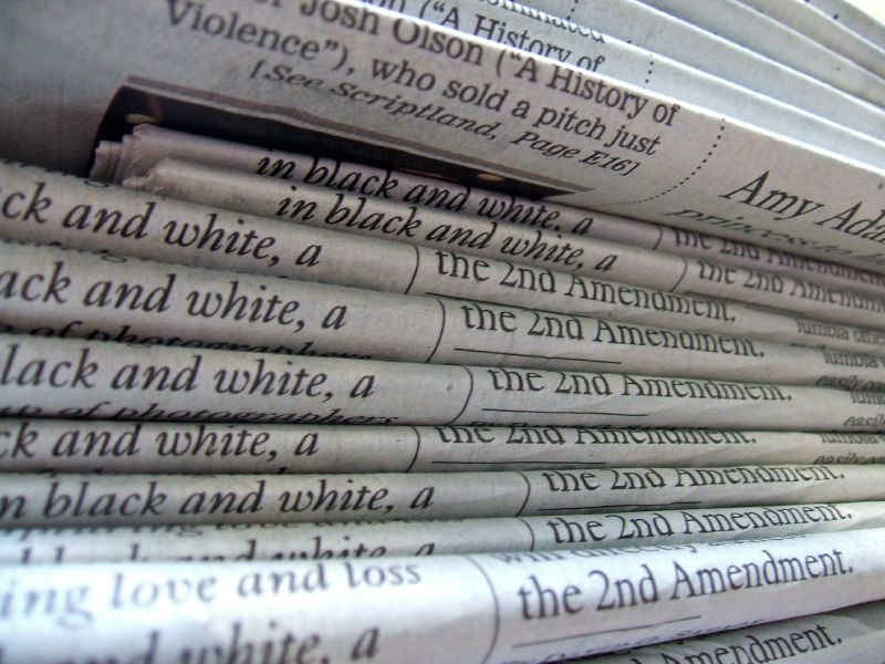 a_stack_of_newspapers
